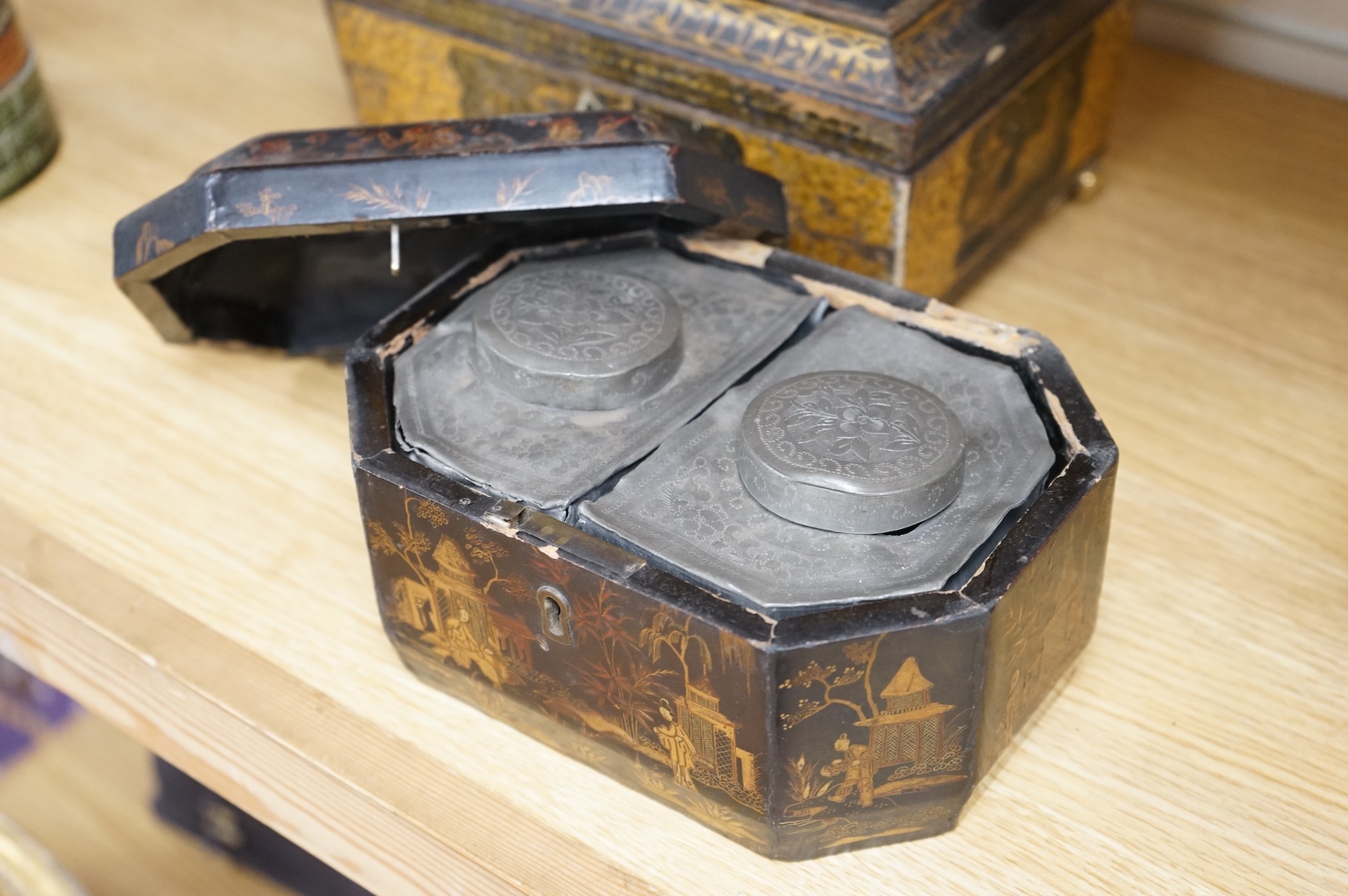 A Chinese lacquer tea caddy and a japanned sewing box (2)